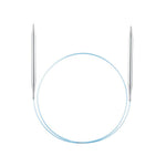 Knitting needles with a circular needle on a white background