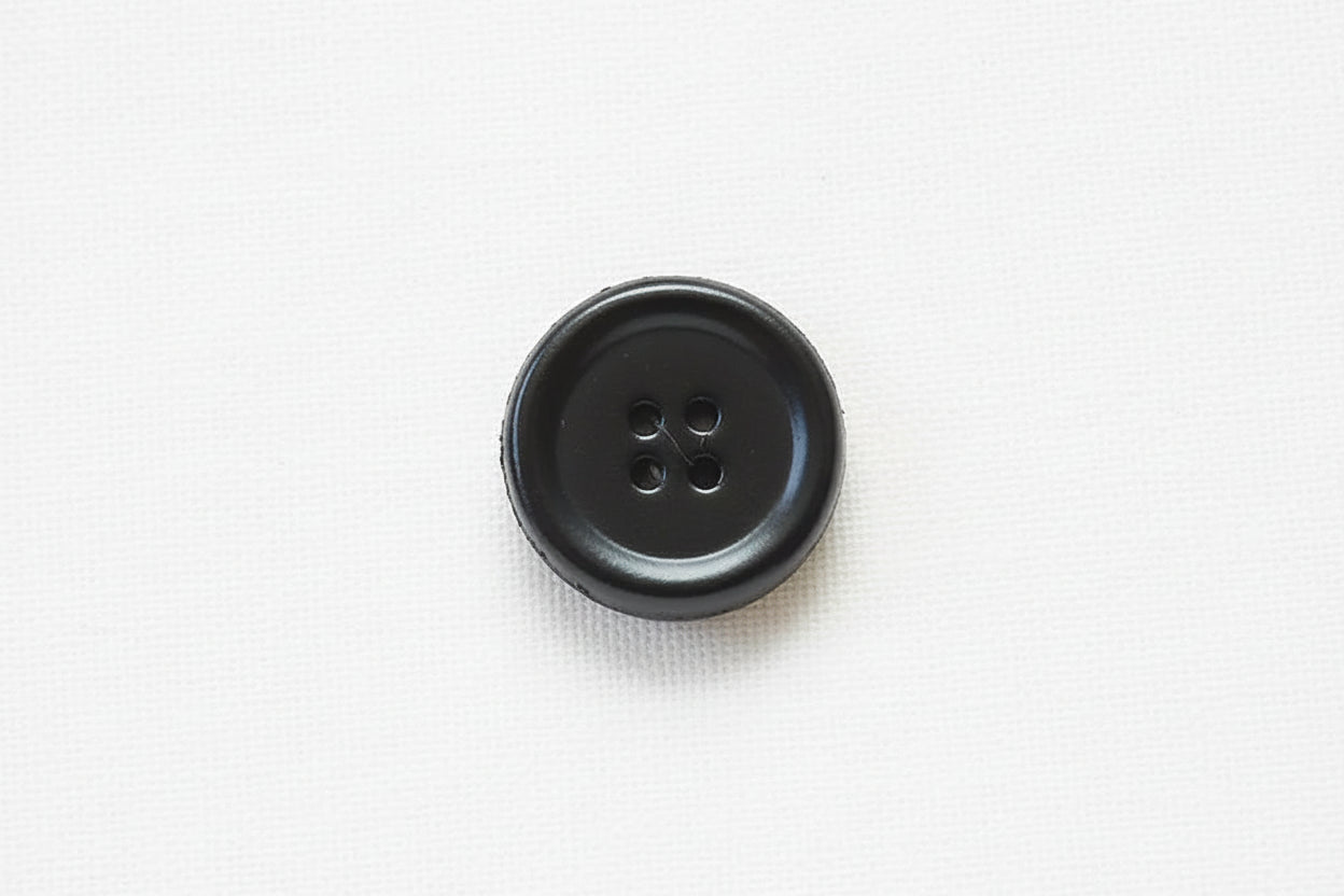 Black Leather button on a white background