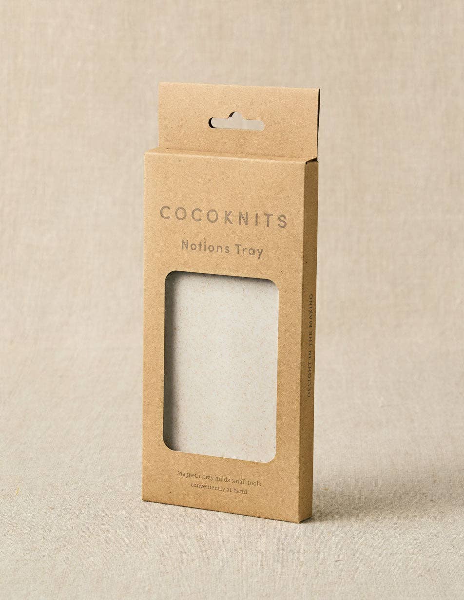 Cocoknits notions tray packaging on a beige background