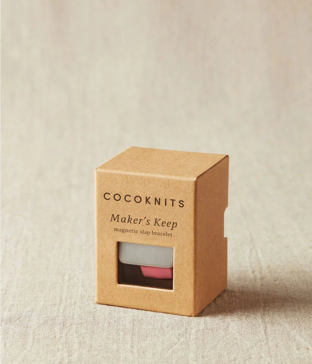 The packaged magnetic slap bracelet for holding notions.