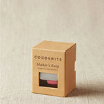 The packaged magnetic slap bracelet for holding notions.